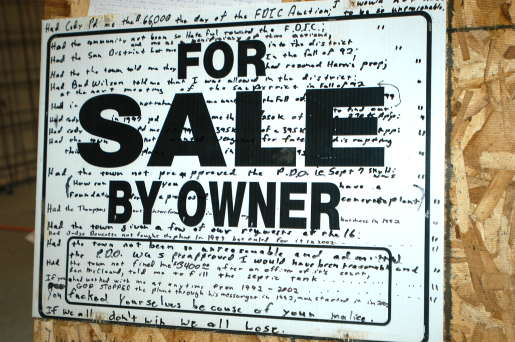 shows Marv's sale sign